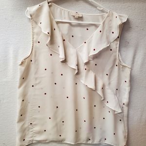 Sleeveless white top